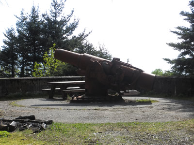 A two-gun 6-inch naval gun battery protected the military airfield here from positions on what is now known as Cannon Beach. A four-gun 155mm battery on
 Panama mounts was located at Point Carrew.